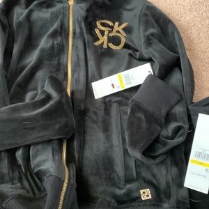 Calvin Klein track suit. Black with gold.  NWT.